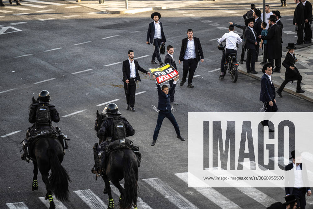 Anti-military service Ultra-Orthodox Jews block road to West Jerusalem JERUSALEM - OCTOBER 8: Mounted Israeli police officers on horseback deployed to the scene intervene against demonstrators as Ultra-Orthodox Jews, known as Haredi, protest the lack of legislation exempting yeshiva students from mandatory military service and the detention of students on grounds of draft evasion in West Jerusalem, Israel, on October 8, 2026. Haredi protesters lie on the road leading to West Jerusalem and block traffic. Mostafa Alkharouf Anadolu Jerusalem Israel. Editorial use only. Please get in touch for any other usage.