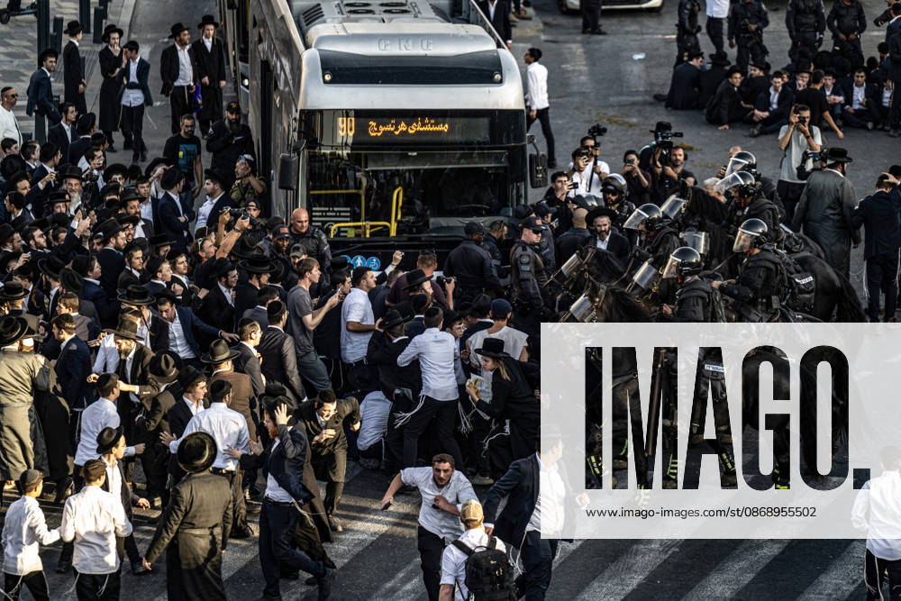 Anti-military service Ultra-Orthodox Jews block road to West Jerusalem JERUSALEM - OCTOBER 8: Mounted Israeli police officers on horseback deployed to the scene intervene against demonstrators as Ultra-Orthodox Jews, known as Haredi, protest the lack of legislation exempting yeshiva students from mandatory military service and the detention of students on grounds of draft evasion in West Jerusalem, Israel, on October 8, 2026. Haredi protesters lie on the road leading to West Jerusalem and block traffic. Mostafa Alkharouf Anadolu Jerusalem Israel. Editorial use only. Please get in touch for any other usage.