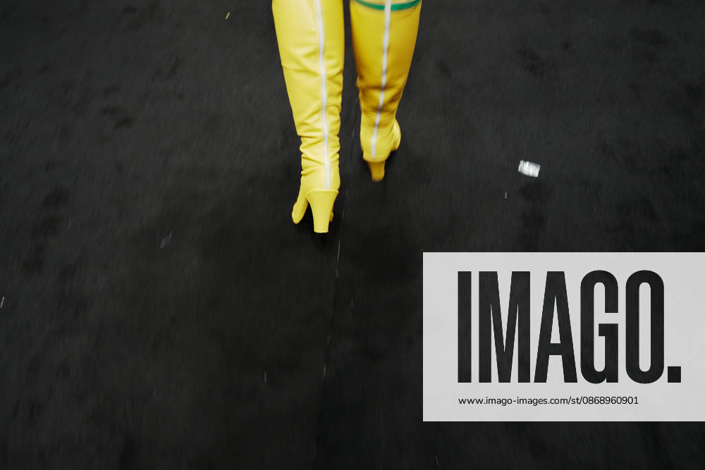 A woman in yellow boots at the 2026 New York Comic Con at the Javits Center on October 8, 2026 in New York. New York USA - ZUMAb148 20261008_zap_b148_053