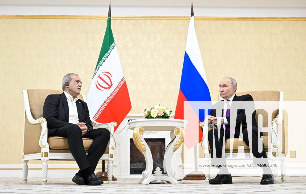 Turkmenistan Russia 9260795 08.10.2026 Iranian President Masoud Pezeshkian and Russian President Vladimir Putin attend a meeting in Turkmenbashi, Turkmenistan. Sergey Bobylev Sputnik Turkmenbashi Turkmenistan