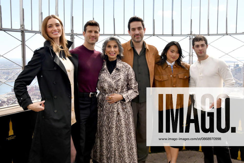 NEW YORK, NY- OCTOBER 8: Allegra Edwards, Parker Young, Rose Abdoo, Ed Weeks, Helen J. Shen and Jaren Lewison at the Empire State Building to Celebrate the Premiere of CBS New Series, Eternally Yours on October 8, 2026 in New York City.