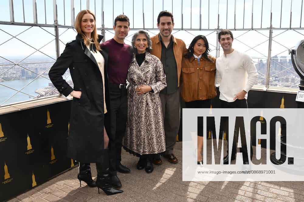 NEW YORK, NY- OCTOBER 8: Allegra Edwards, Parker Young, Rose Abdoo, Ed Weeks, Helen J. Shen and Jaren Lewison at the Empire State Building to Celebrate the Premiere of CBS New Series, Eternally Yours on October 8, 2026 in New York City.