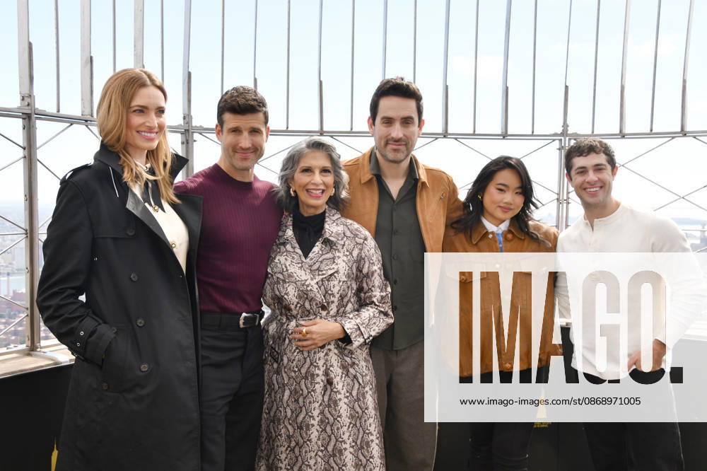 NEW YORK, NY- OCTOBER 8: Allegra Edwards, Parker Young, Rose Abdoo, Ed Weeks, Helen J. Shen and Jaren Lewison at the Empire State Building to Celebrate the Premiere of CBS New Series, Eternally Yours on October 8, 2026 in New York City.
