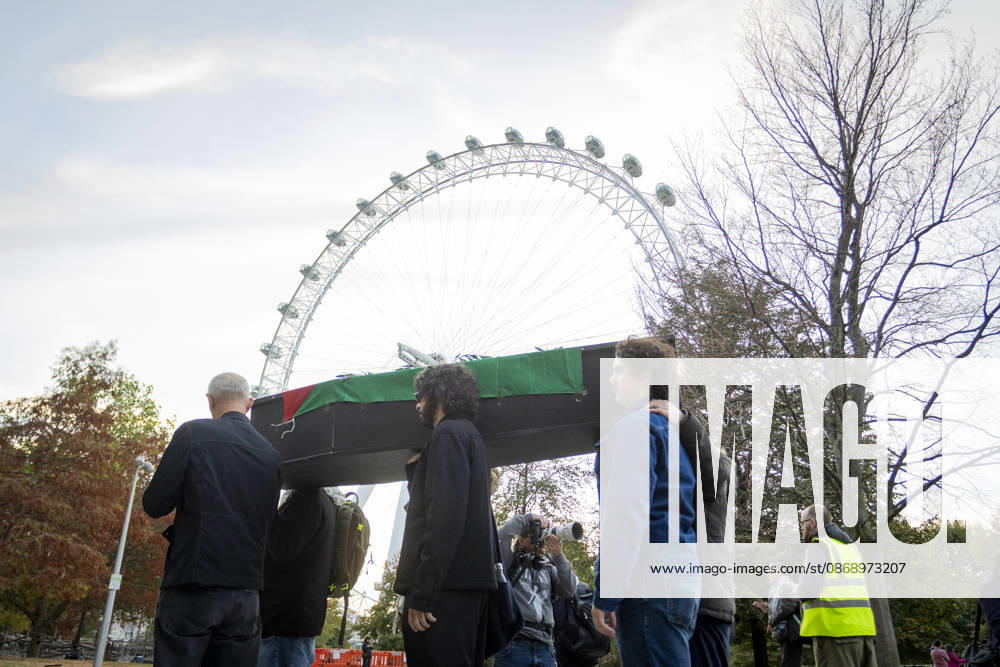 Pro-Palestine Silent Funeral Procession Central London, October 8, 2026 A pro-Palestine silent funeral procession took place in Central London, with demonstrators walking in silence to remember Palestinians killed in the conflict in Gaza. Participants carried Palestinian flags and placards, while some held a coffin and others carried effigies wrapped in burial shrouds, symbolising those killed in the conflict., Credit:Zak Irfan Avalon