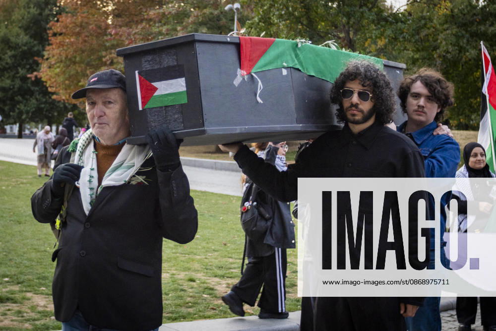 Pro-Palestine Silent Funeral Procession Central London, October 8, 2026 A pro-Palestine silent funeral procession took place in Central London, with demonstrators walking in silence to remember Palestinians killed in the conflict in Gaza. Participants carried Palestinian flags and placards, while some held a coffin and others carried effigies wrapped in burial shrouds, symbolising those killed in the conflict., Credit:Zak Irfan Avalon