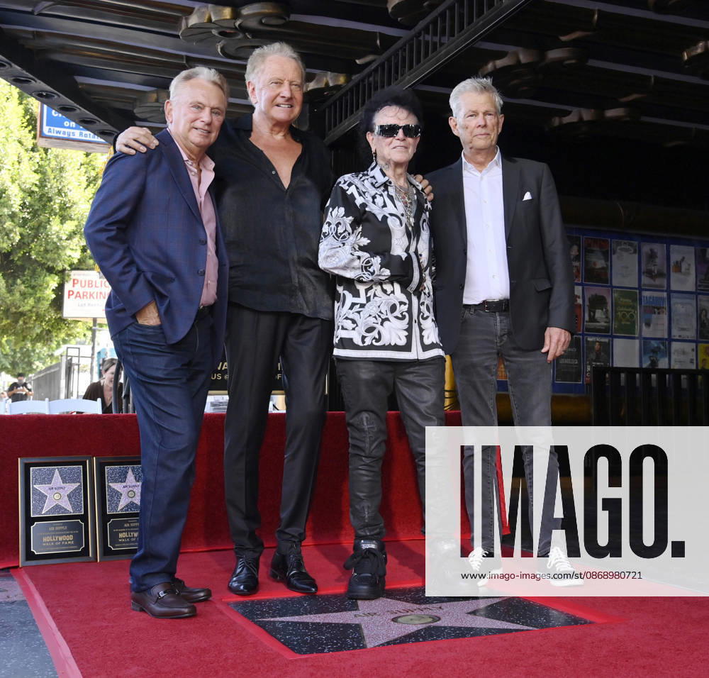 Pat Sajak, honorees Graham Russell, Russell Hitchcock and David Foster (L-R) pose during an unveiling ceremony honoring the rock duo Air Supply with the 2,859th star on the Hollywood Walk of Fame in Los Angeles on Thursday October 8, 2026. LAP2026100807 JIMxRUYMEN
