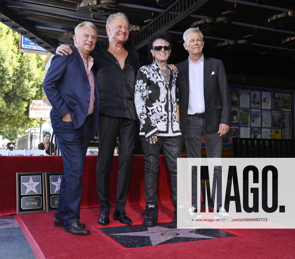 Pat Sajak, honorees Graham Russell, Russell Hitchcock and David Foster (L-R) pose during an unveiling ceremony honoring the rock duo Air Supply with the 2,859th star on the Hollywood Walk of Fame in Los Angeles on Thursday October 8, 2026. LAP2026100808 JIMxRUYMEN