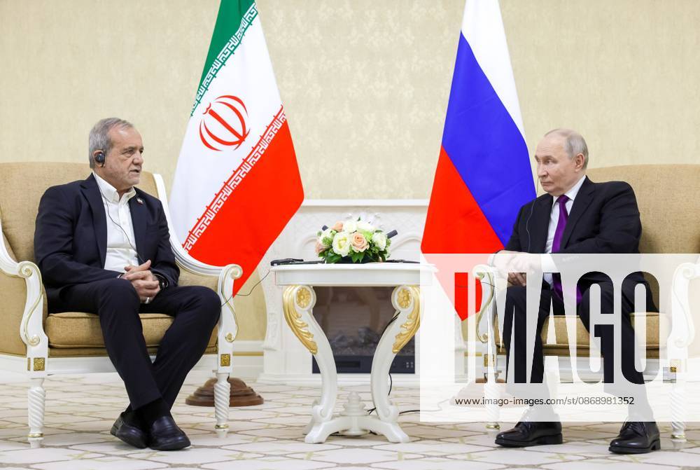 Turkmenistan Russia 9260832 08.10.2026 Iranian President Masoud Pezeshkian and Russian President Vladimir Putin attend a meeting in Turkmenbashi, Turkmenistan. Gavriil Grigorov Sputnik Turkmenbashi Turkmenistan