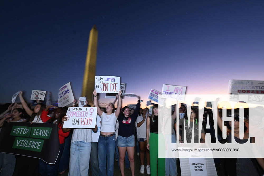 Demonstrators march during a nationwide day of action against sexual violence near the Washington Monument in Washington. The protests follow national attention surrounding allegations by a former Cornell University student identified as Jane Doe and calls for greater accountability for sexual violence. Lexington U.S. - ZUMAk206 20261008_znp_k206_024