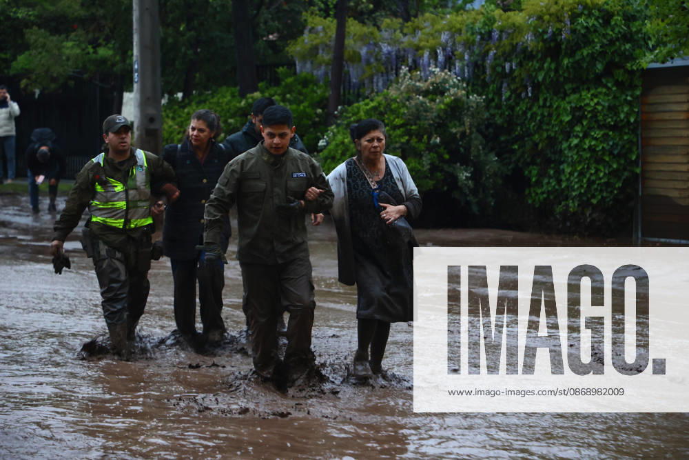 Santiago, October 8, 2026: A mudslide is affecting the area from San Carlos de Apoquindo to Los Dominicos in the Las Condes district, causing widespread damage and sweeping away vehicles and people. Dragomir Yankovic Aton, Chile, Santiago, Chile Aton 1197972