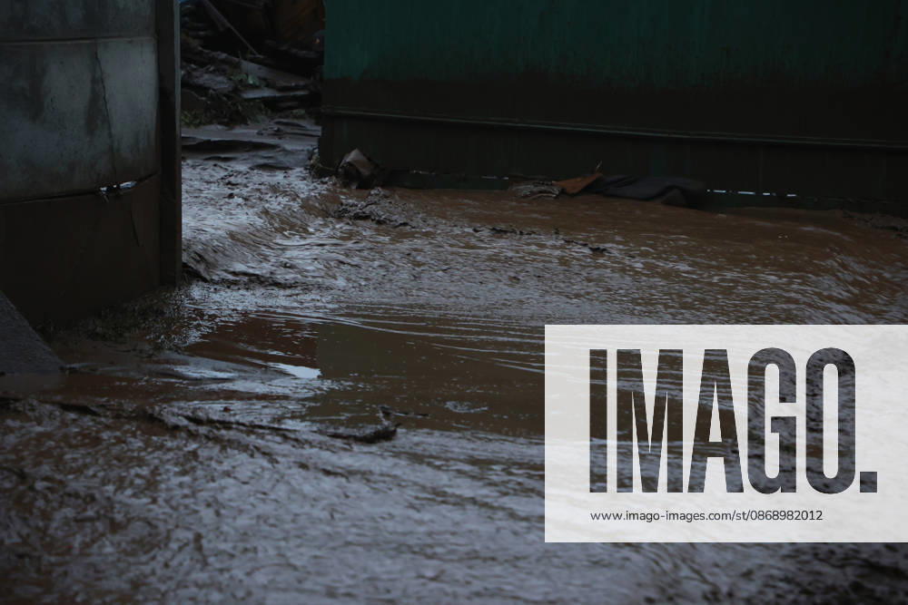 Santiago, October 8, 2026: A mudslide is affecting the area from San Carlos de Apoquindo to Los Dominicos in the Las Condes district, causing widespread damage and sweeping away vehicles and people. Dragomir Yankovic Aton, Chile, Santiago, Chile Aton 1197975