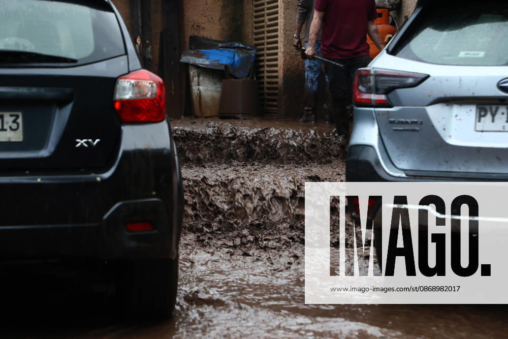 Santiago, October 8, 2026: A mudslide is affecting the area from San Carlos de Apoquindo to Los Dominicos in the Las Condes district, causing widespread damage and sweeping away vehicles and people. Dragomir Yankovic Aton, Chile, Santiago, Chile Aton 1197980