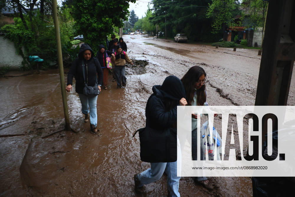 Santiago, October 8, 2026: A mudslide is affecting the area from San Carlos de Apoquindo to Los Dominicos in the Las Condes district, causing widespread damage and sweeping away vehicles and people. Dragomir Yankovic Aton, Chile, Santiago, Chile Aton 1197983