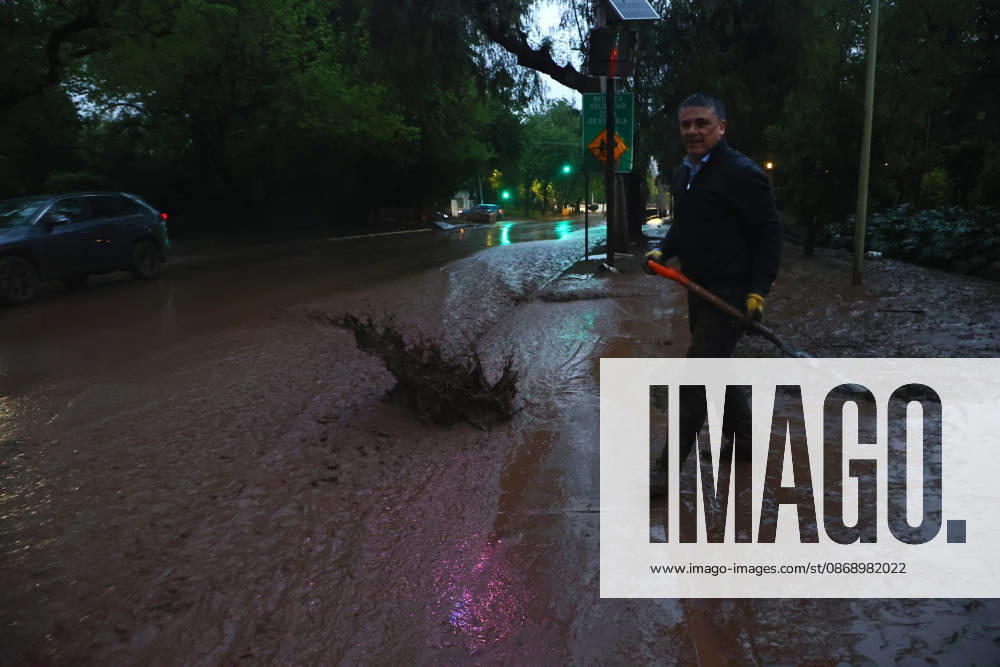 Santiago, October 8, 2026: A mudslide is affecting the area from San Carlos de Apoquindo to Los Dominicos in the Las Condes district, causing widespread damage and sweeping away vehicles and people. Dragomir Yankovic Aton, Chile, Santiago, Chile Aton 1197958