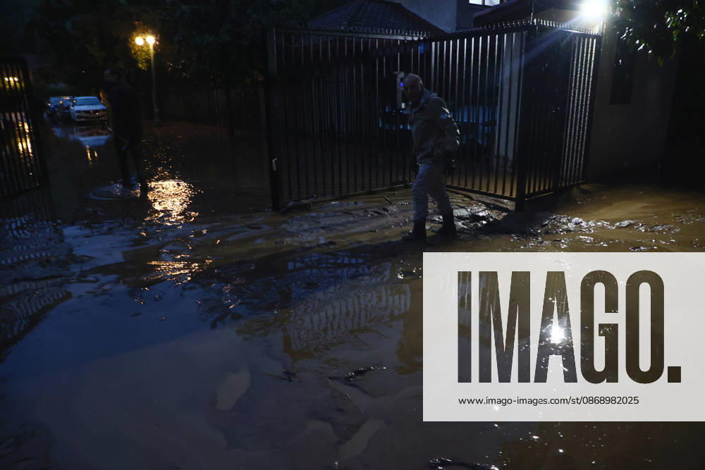 Santiago, October 8, 2026: A mudslide is affecting the area from San Carlos de Apoquindo to Los Dominicos in the Las Condes district, causing widespread damage and sweeping away vehicles and people. Dragomir Yankovic Aton, Chile, Santiago, Chile Aton 1197961