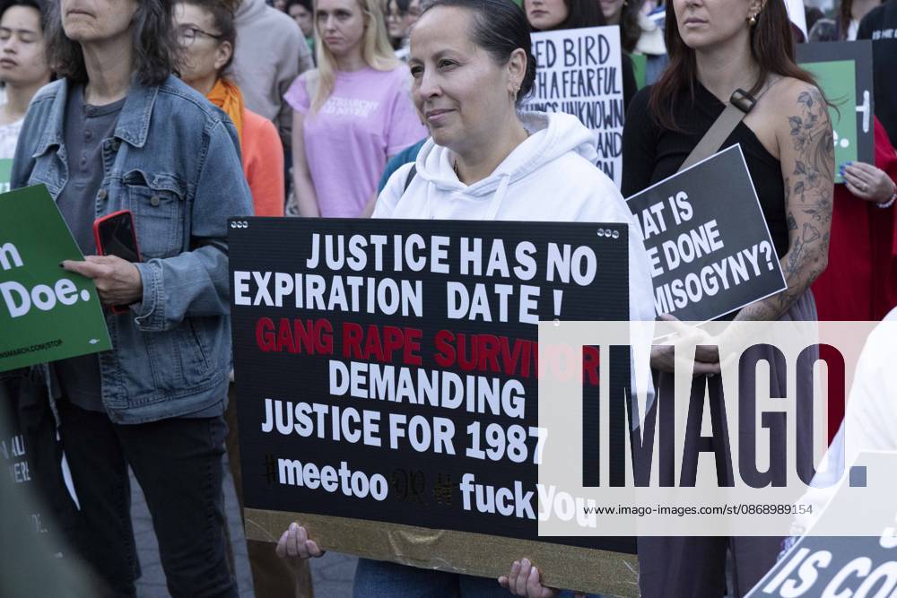 A demonstrator holds a sign that reads JUSTICE HAS NO EXPIRATION DATE! GANG RAPE SURVIVOR DEMANDING JUSTICE FOR 1987 meetoo fuckyou joining hundreds at a rally in Foley Square outside the New York State Supreme Court building in Lower Manhattan under the banner . StopSexualViolence: From the Frat House to the White House. The protest is one of many rallies and campus walkouts around the country demanding justice for Cornell s Jane Doe. New York USA - ZUMAr174 20261008_znp_r174_017