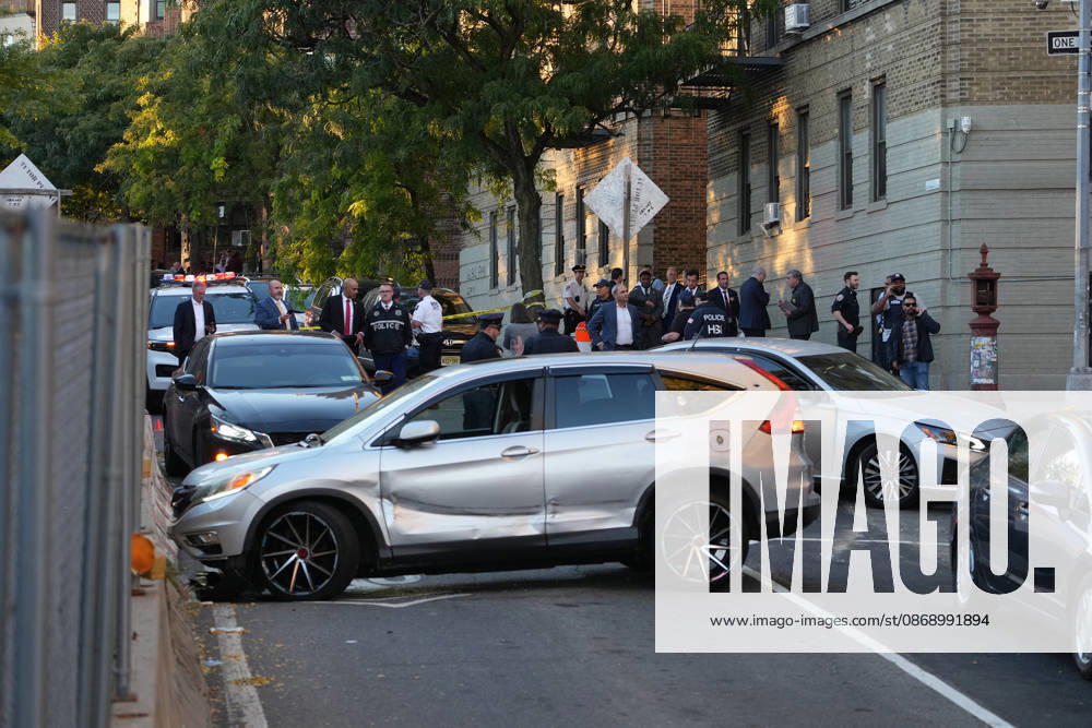 US-NEWS-NYC-ICE-SHOOTING-FILEPIC-NY Law enforcement officers investigate after ICE agents shot and wounded a man on Marble Hill Avenue, near W. 225th Street, in the Bronx on Thursday, Oct. 8, 2026, New York. (Barry Williams New York Daily News TNS)