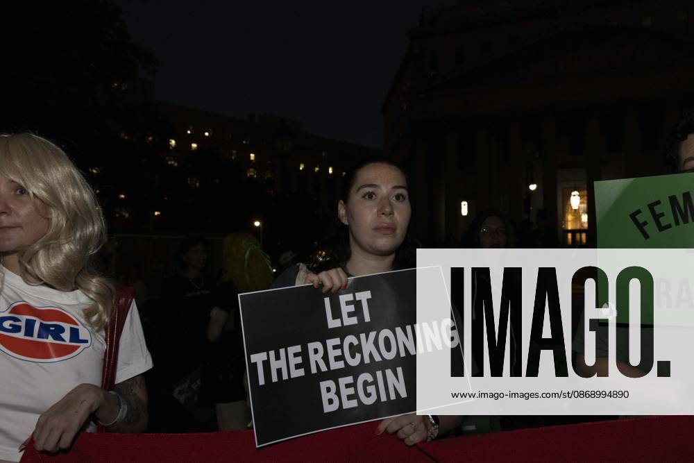 A demonstrator holds a sign that reads LET THE RECKONING BEGIN joining hundreds at a rally in Foley Square outside the New York State Supreme Court building in Lower Manhattan under the banner . StopSexualViolence: From the Frat House to the White House. The protest is one of many rallies and campus walkouts around the country demanding justice for Cornell s Jane Doe. New York USA - ZUMAr174 20261008_znp_r174_054
