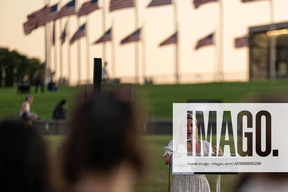 A demonstrator speaks during a protest against sexual violence near the Washington Monument in Washington. Demonstrations are being held across the country in solidarity with a former Cornell University student identified as Jane Doe and survivors of sexual violence. Washington United States - ZUMAk206 20261008_znp_k206_038