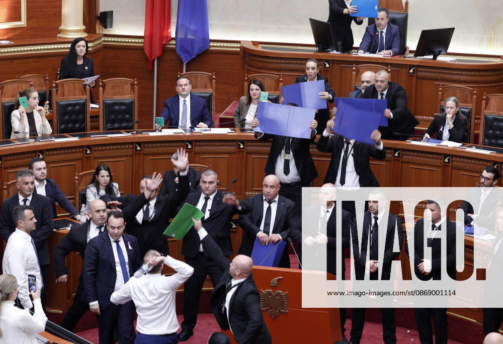 Albanian Parliament Vote the Territorial Reform in Tirana, Albania. Bodyguards try to protect Albanian Prime Minister Edi Rama (C) as an opposition MP throws a water bottle during a parliamentary session where a government s proposed administrative and territorial reform is voted on in Tirana, Albania, early on October 9, 2026. Light Studio Agency Malton Dibra Tirana Albania