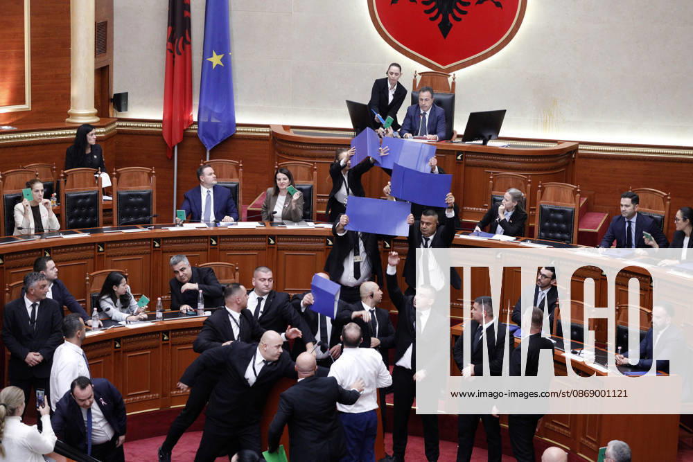 Albanian Parliament Vote the Territorial Reform in Tirana, Albania. Bodyguards try to protect Albanian Prime Minister Edi Rama (C) as an opposition MP throws a water bottle during a parliamentary session where a government s proposed administrative and territorial reform is voted on in Tirana, Albania, early on October 9, 2026. Light Studio Agency Malton Dibra Tirana Albania