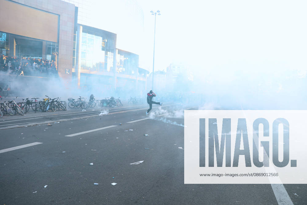 High School And University Student Protest - Paris A protester kicks away a tear gas canister fired by police forces, during a nationwide youth demonstration. Nationwide mobilization by high school and university students calling for better teaching and study conditions, increased funding and staffing, an end to overcrowded classrooms and deteriorating infrastructure, and improved access to education, amidst concerns over social inequalities and student financial insecurity in Paris, France, October 8, 2026. Photo by Christophe Michel ABACAPRESS.COM Paris ILE DE FRANCE France