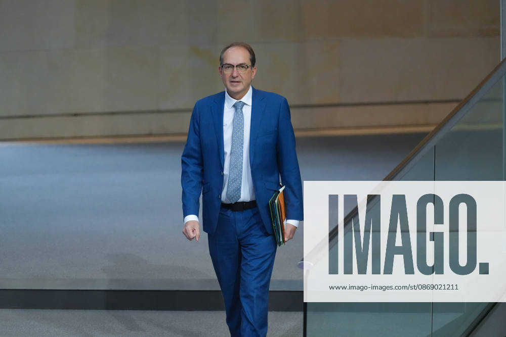 German Bundestag, 100th Plenary Session: Alexander Dobrindt, Federal Minister of the Interior, walks through the chamber toward the government bench during the 100th session of the German Bundestag in Berlin, October 9, 2026, Berlin, Berlin, Germany