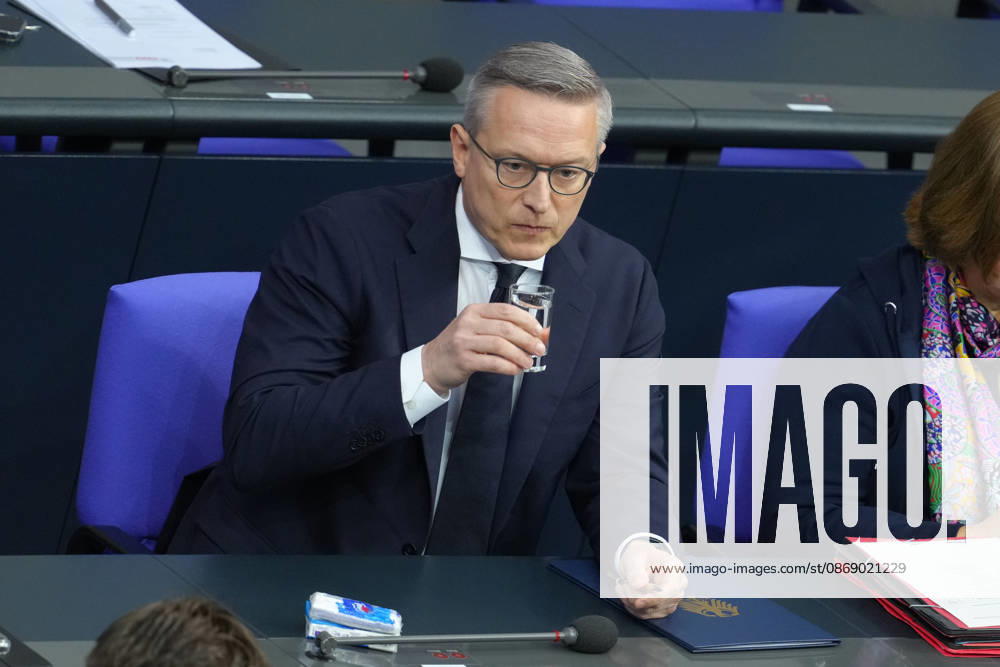 German Bundestag, 100th Plenary Session: Dr. Karsten Wildberger, Federal Minister for Digitalization and State Modernization, drinks a glass of water on the government bench during the 100th session of the German Bundestag in Berlin, October 9, 2026, Berlin, Germany