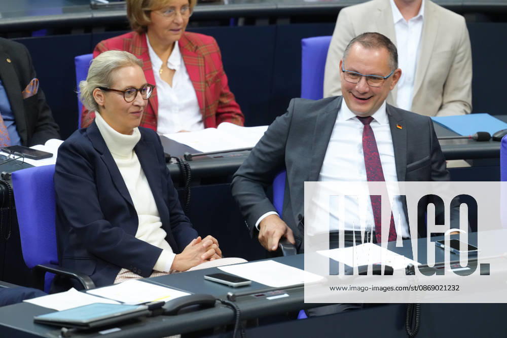 German Bundestag, 100th Plenary Session: AfD leaders Alice Weidel and Tino Chrupalla are having fun together in their seats in the plenary chamber during the 100th session of the German Bundestag in Berlin, October 9, 2026, Berlin, Germany