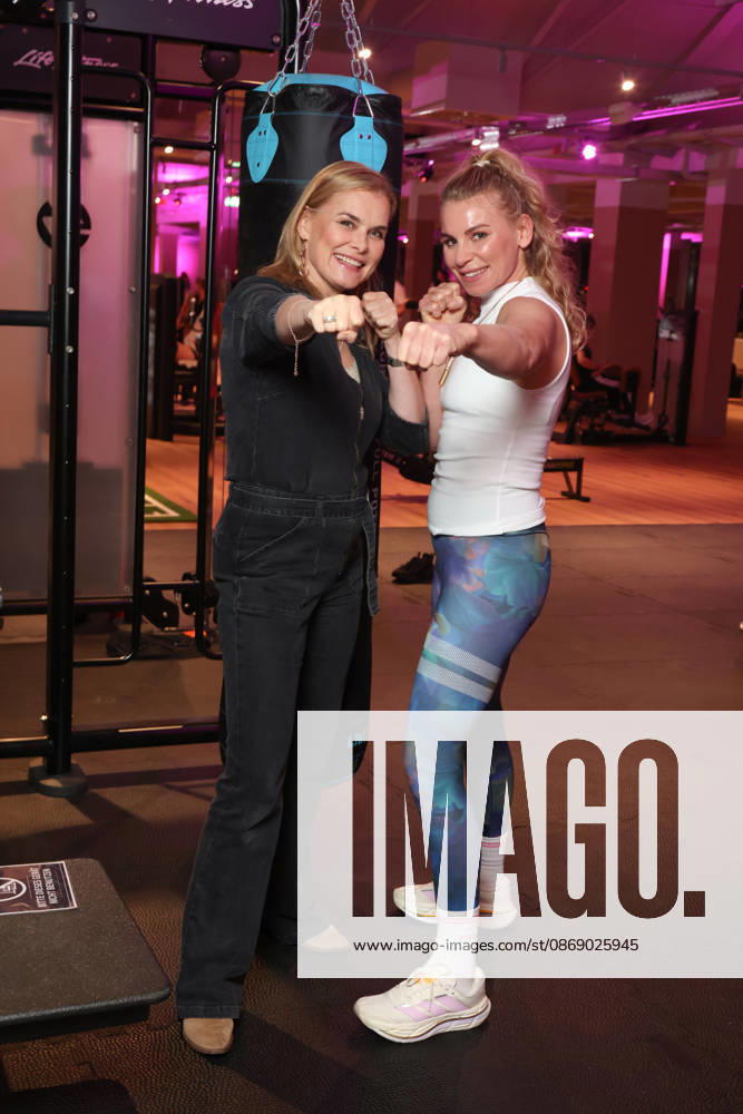 Actress Andrea Lüdke with boxer Natalie Zimmermann; fitness equipment instead of a red carpet—the Sports Club’s 20th fitness studio opened in Hamburg’s Poppenbüttel district, where celebrity guests immediately tried out the fitness and wellness equipment, including the ladies’ area, saunas, and relaxation pool, spread across 5,000 square meters, Hamburg