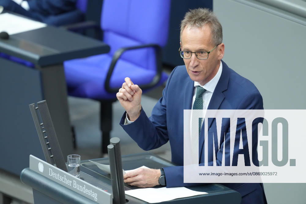German Bundestag, 100th Plenary Session: Detlef Seif (CDU) — In this portrait, the member of parliament uses hand gestures to emphasize his points during his speech on the shift in migration policy at the 100th session of the German Bundestag in Berlin, October 9, 2026, Berlin, Germany