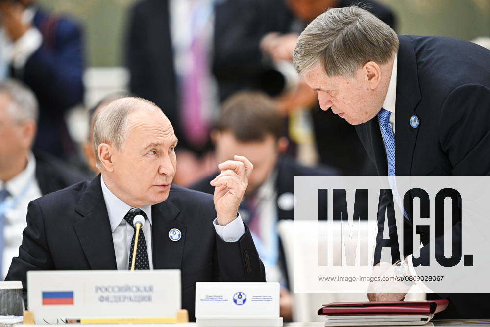 TURKMENISTAN, BALKAN PROVINCE - OCTOBER 9, 2026: Russia s President Vladimir Putin (L) and his adviser Yuri Ushakov attend a narrow-format meeting of the CIS Council of Heads of State in Turkmenbashi Turkmenistan - ZUMAt113 20261009_zaa_t113_097