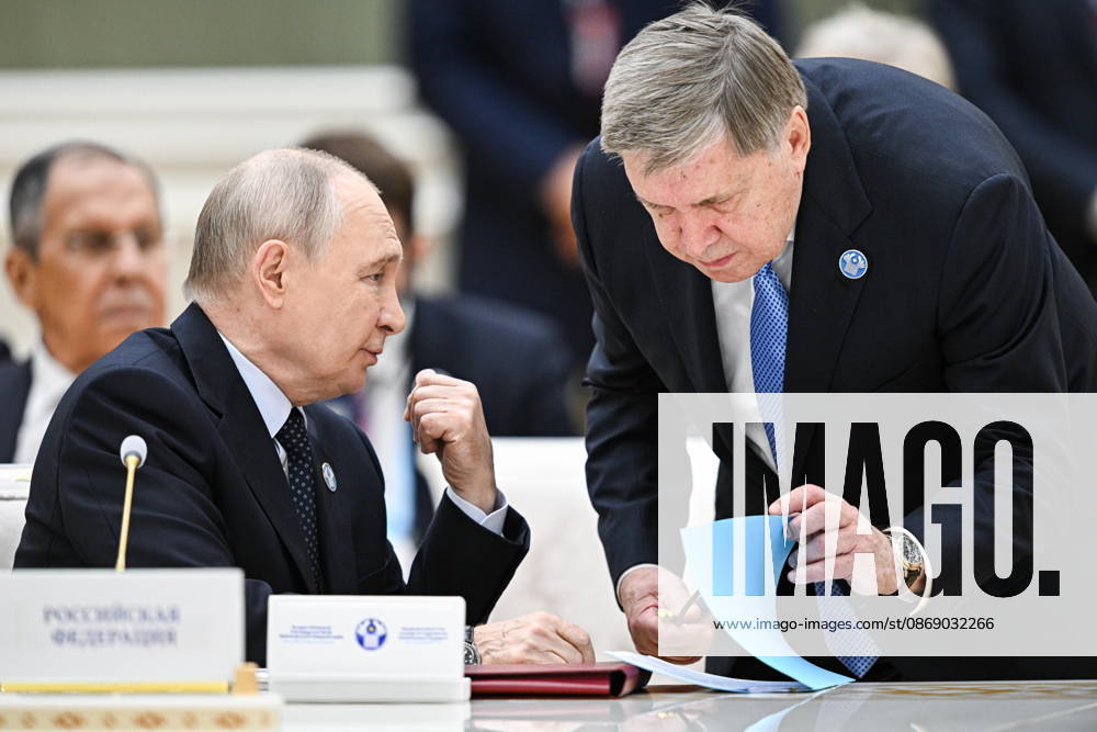 TURKMENISTAN, BALKAN PROVINCE - OCTOBER 9, 2026: Russia s President Vladimir Putin (L) and his adviser Yuri Ushakov during a narrow-format meeting of the CIS Council of Heads of State in Turkmenbashi Turkmenistan - ZUMAt113 20261009_zaa_t113_140