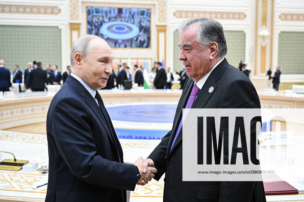 TURKMENISTAN, BALKAN PROVINCE - OCTOBER 9, 2026: Russia s President Vladimir Putin and Tajikistan s President Emomali Rahmon shake hands after a narrow-format meeting of the CIS Council of Heads of State in Turkmenbashi Turkmenistan - ZUMAt113 20261009_zaa_t113_147