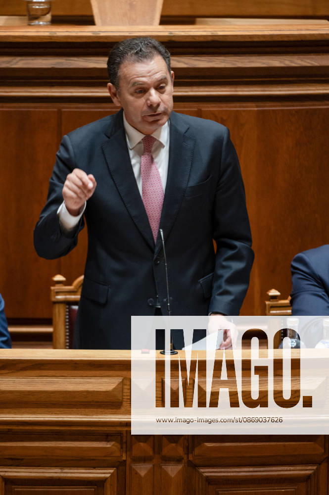 Portuguese Prime Minister LUIS MONTENEGRO gestures while speaking and holding a document during a parliamentary debate at the Assembleia da Republica in Lisbon, Portugal, on October 9, 2026. The sitting includes the fortnightly debate with the prime minister, followed by a debate preparing Portugal s position for the European Council. Lisbon Portugal - ZUMAr238 20261009_zip_r238_012