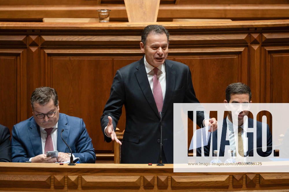 Portuguese Prime Minister LUIS MONTENEGRO speaks from the government bench, gesturing while holding a sheet of paper, during a fortnightly parliamentary debate at the Assembleia da Republica in Lisbon, Portugal, on October 9, 2026. The sitting includes government-accountability questioning followed by a preparatory debate for the European Council. Lisbon Portugal - ZUMAr238 20261009_zip_r238_028