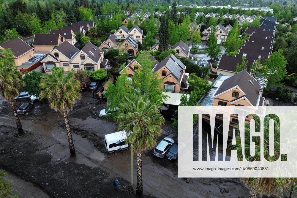 Santiago, October 9, 2026: Consequences of a mudslide that affected the area from San Carlos de Apoquindo to Los Dominicos in the Las Condes district, causing widespread damage and sweeping away vehicles and people. Diego Martin Aton, Chile, Aton 1198079 jpeg