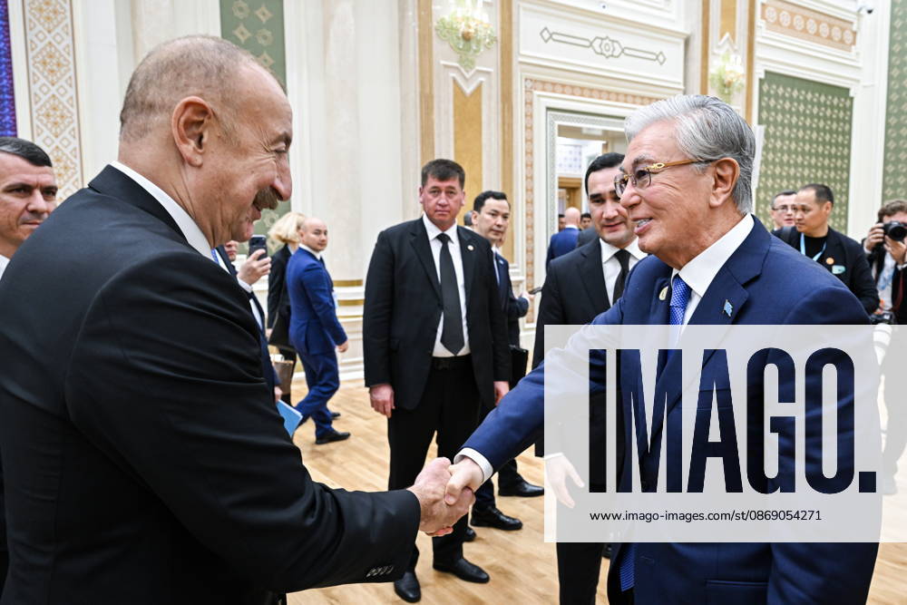 TURKMENISTAN, BALKAN PROVINCE - OCTOBER 9, 2026: Azerbaijan s President Ilham Aliyev (L front) and Kazakhstan s President Kassym-Jomart Tokayev (R front) shake hands after the Caspian Ecological Summit Turkmenistan - ZUMAt113 20261009_zaa_t113_480