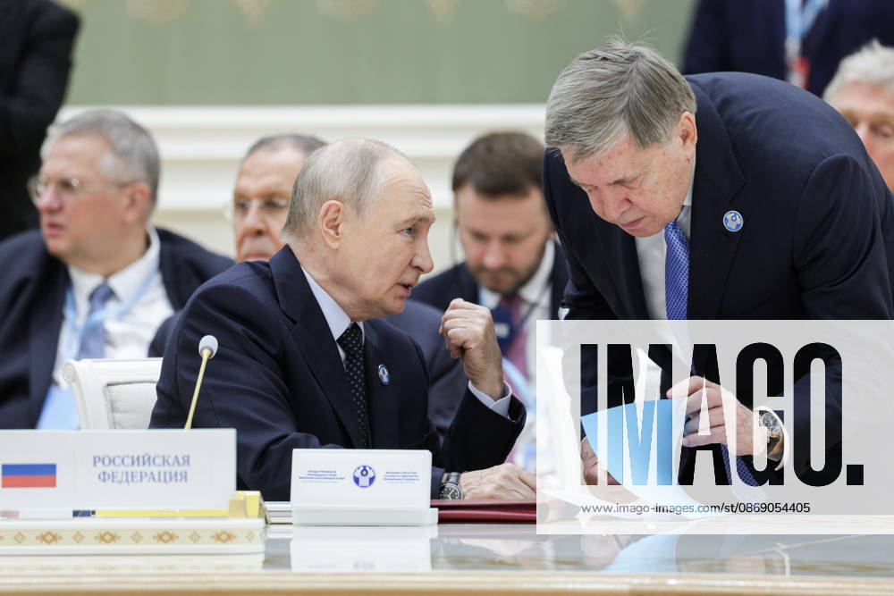 TURKMENISTAN, BALKAN PROVINCE - OCTOBER 9, 2026: Russia s President Vladimir Putin and his aide Yuri Ushaov (L-R front) attend an expanded meeting of the CIS Council of Heads of State in Turkmenbashi Turkmenistan - ZUMAt113 20261009_zaa_t113_487