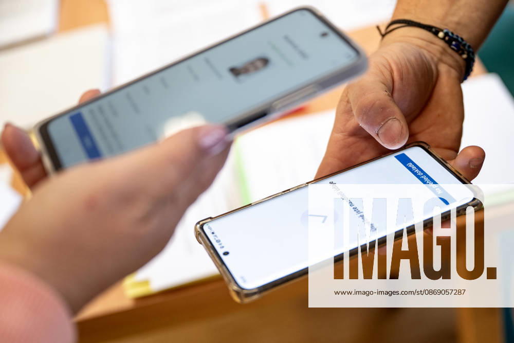 The two-day elections to municipal assemblies started in the Czech Republic together with the first round of the elections to one-third of the Senate, on October 9, 2026. On the photo a voter identifies himself at a polling station using the eDoklady app (digital ID copy) on his mobile phone before casting his vote in Hradec Kralove. (CTKxPhoto DavidxTanecek) CTKPhotoP2026100905620 CTKPhotoP2026100905620