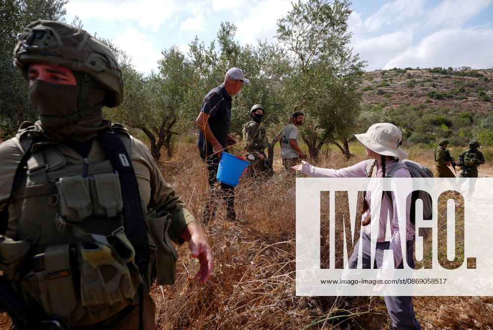 Clashes erupt between Israeli settlers and Palestinian farmers in West Bank RAMALLAH, WEST BANK - OCTOBER 9: Clashes break out between Israeli settlers, accompanied by Israeli soldiers, and Palestinian farmers harvesting olives in the town of Deir Ibzi, near Ramallah in West Bank, on October 9, 2026. The incident reportedly involved damage to olive crops and provocative actions by the settlers. Issam Rimawi Anadolu West Bank Palestine. Editorial use only. Please get in touch for any other usage.