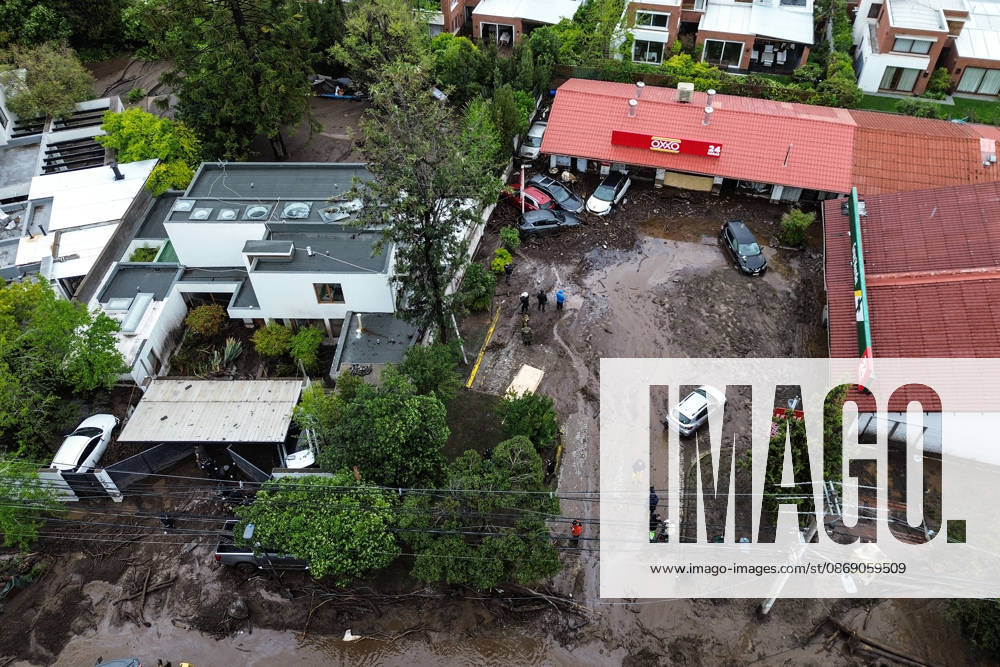 Santiago, October 9, 2026: Consequences of a mudslide that affected the area from San Carlos de Apoquindo to Los Dominicos in the Las Condes district, causing widespread damage and sweeping away vehicles and people. Diego Martin Aton, Chile, Aton 1198131 jpeg
