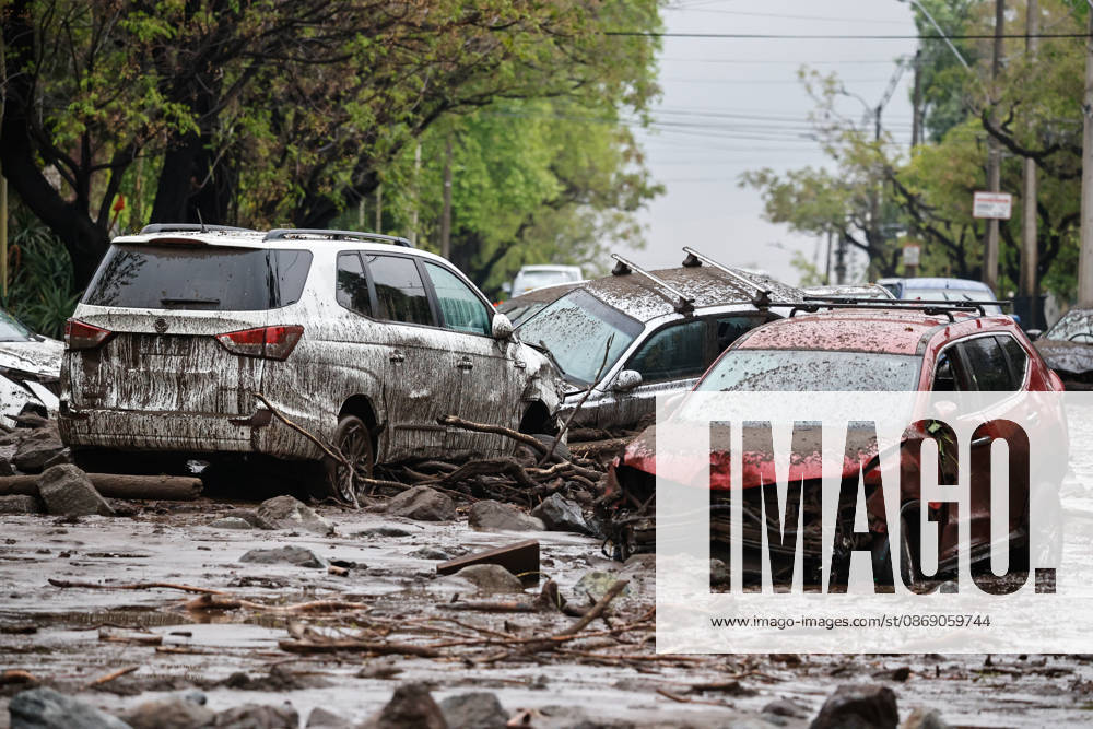 Santiago, October 9, 2026: Consequences of a mudslide that affected the area from San Carlos de Apoquindo to Los Dominicos in the Las Condes district, causing widespread damage and sweeping away vehicles and people. Diego Martin Aton, Chile, Aton 1198117 jpeg