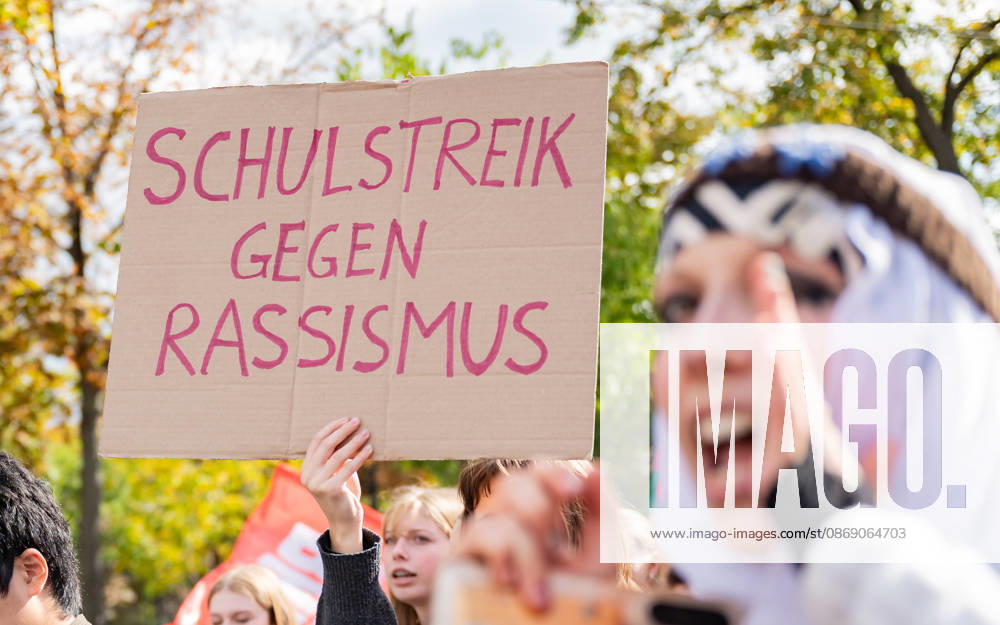 Protest Against the Headscarf Ban. Participants in the School on Fire demonstration—a school strike against the headscarf ban, but also against racism in general— sexism, and militarization in schools at Human Rights Square in Vienna, Austria Vienna Human Rights Square Vienna Austria
