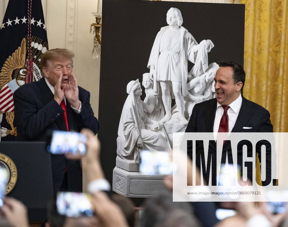United States President Donald J Trump greets singer Christopher Macchio as he hosts a Columbus Day Celebration in the East Room of the White House in Washington, DC, USA on Friday, October 8, 2026 Washington USA - ZUMAs152 20261009_faa_s152_008