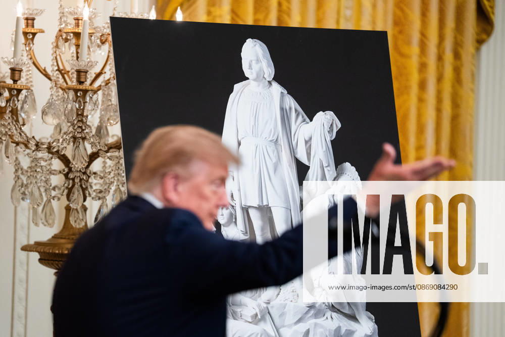 United States President Donald J Trump makes remarks in front of a poster of a statue of Christopher Columbus as he hosts a Columbus Day Celebration in the East Room of the White House in Washington, DC, USA on Friday, October 8, 2026 Washington USA - ZUMAs152 20261009_faa_s152_053