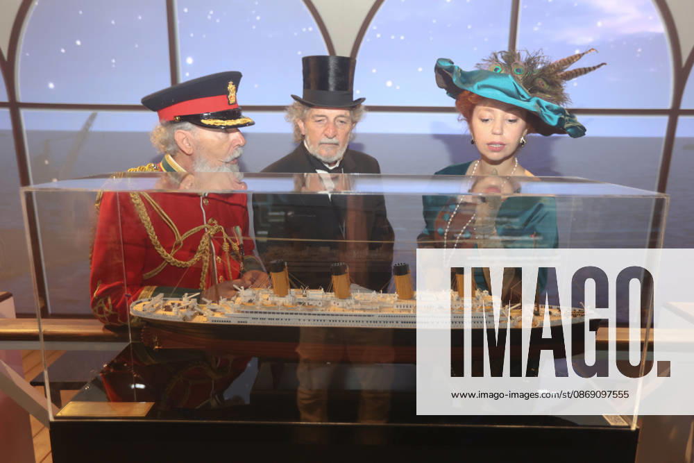 People in Victorian period attire view a model of the Titanic for The Legend of the Titanic , as the immersive exhibition, opens in Malaga after its premiere in Madrid and gathers more than a million visitors. The most immersive Titanic arrives in Malaga with a tour of the cabins. An exhibition 360 arrives in the city with five different experiences in which virtual reality allows you to know the rooms of the ship and listen live to its musicians. The exhibition will be open to the public from October 8 to January 5. Malaga Spain - ZUMAc161 20261009_zap_c161_030