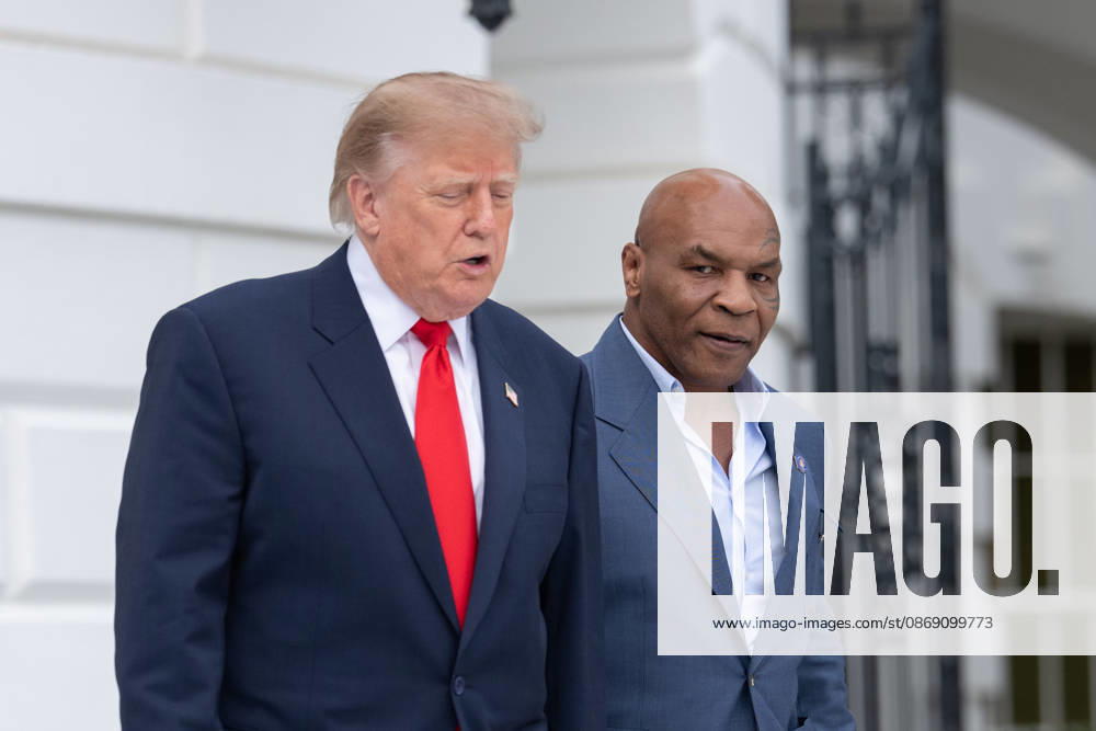 President Donald Trump walks with former professional boxer Mike Tyson on the South Lawn of the White House before boarding Marine One in Washington, DC on Friday, Oct. 9, 2026. Trump is heading to Syracuse on Friday to boost Republican gubernatorial candidate Bruce Blakeman, who is trailing Governor Kathy Hochul in polls ahead of November s election. WASP20261009141 AaronxSchwartz
