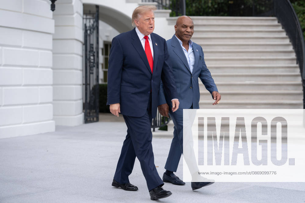 President Donald Trump walks with former professional boxer Mike Tyson on the South Lawn of the White House before boarding Marine One in Washington, DC on Friday, Oct. 9, 2026. Trump is heading to Syracuse on Friday to boost Republican gubernatorial candidate Bruce Blakeman, who is trailing Governor Kathy Hochul in polls ahead of November s election. WASP20261009142 AaronxSchwartz