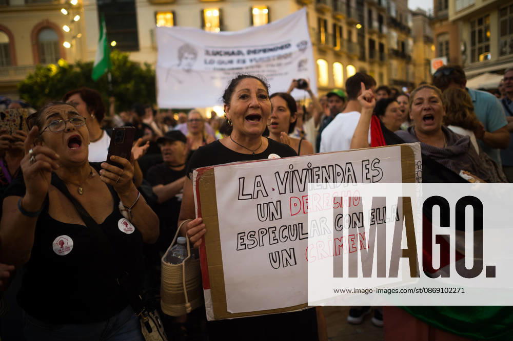Protest in memory of Maricarmen in Malaga - 09 Oct 2026 A protester is seen holding a placard that says: Housing is a right. Speculating on housing is a crime during a tribute and minute of silence in memory of Maricarmen Abascal, the 87-year-old woman who was evicted of her house and died in hospital a few days later. Thousands of people demand decent housing and to continue with the legacy of Maricarmen Abascal. Spain’s housing crisis has forced people to take to the streets, urging the Spanish government to take action and implement effective policies to regulate housing prices and protect vulnerable people. Malaga Spain